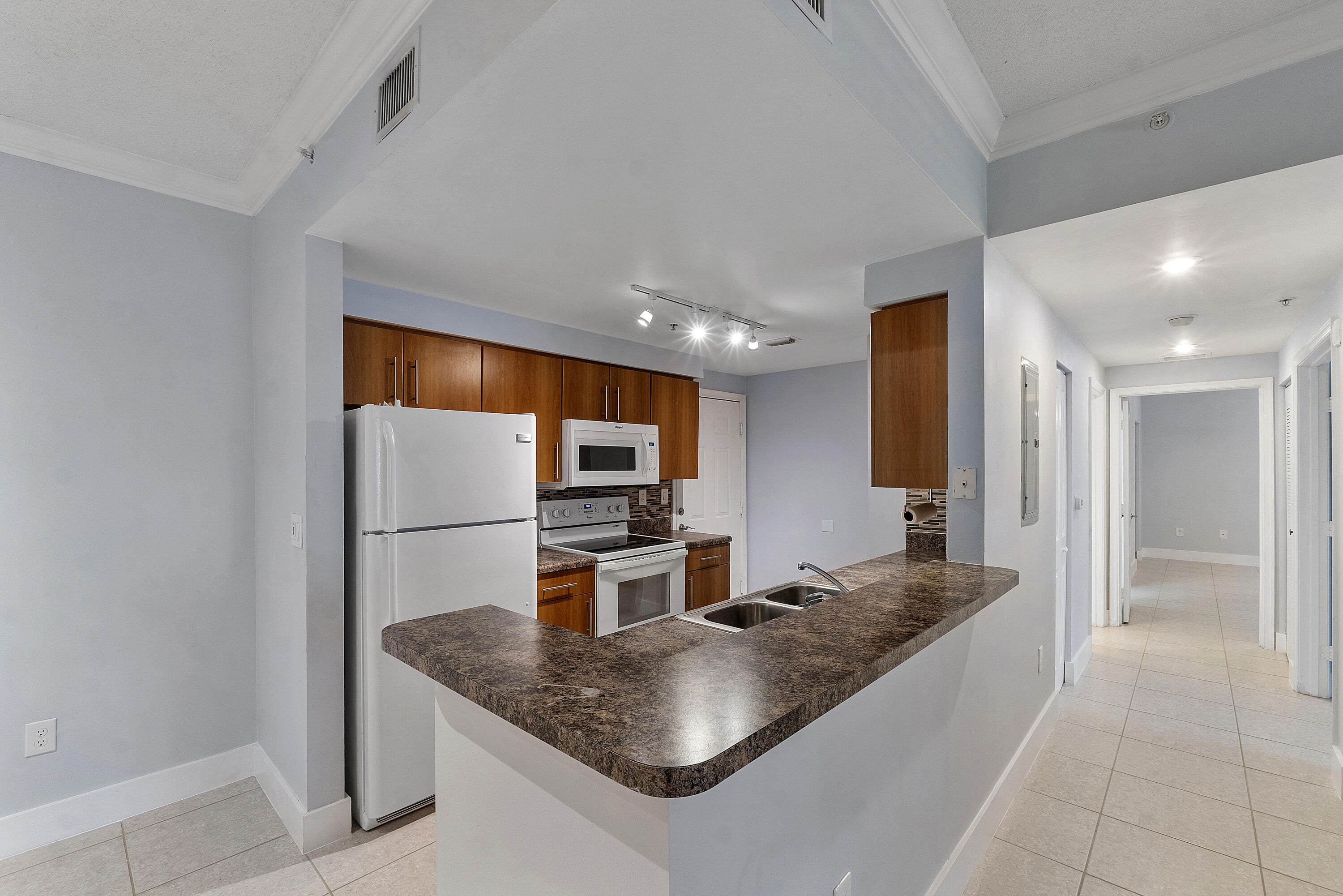 5980 West Sample Road, Unit 104 Coral Springs, FL 33067 - Photo 4 of 12 5980 W SAMPLE ROAD U104_011