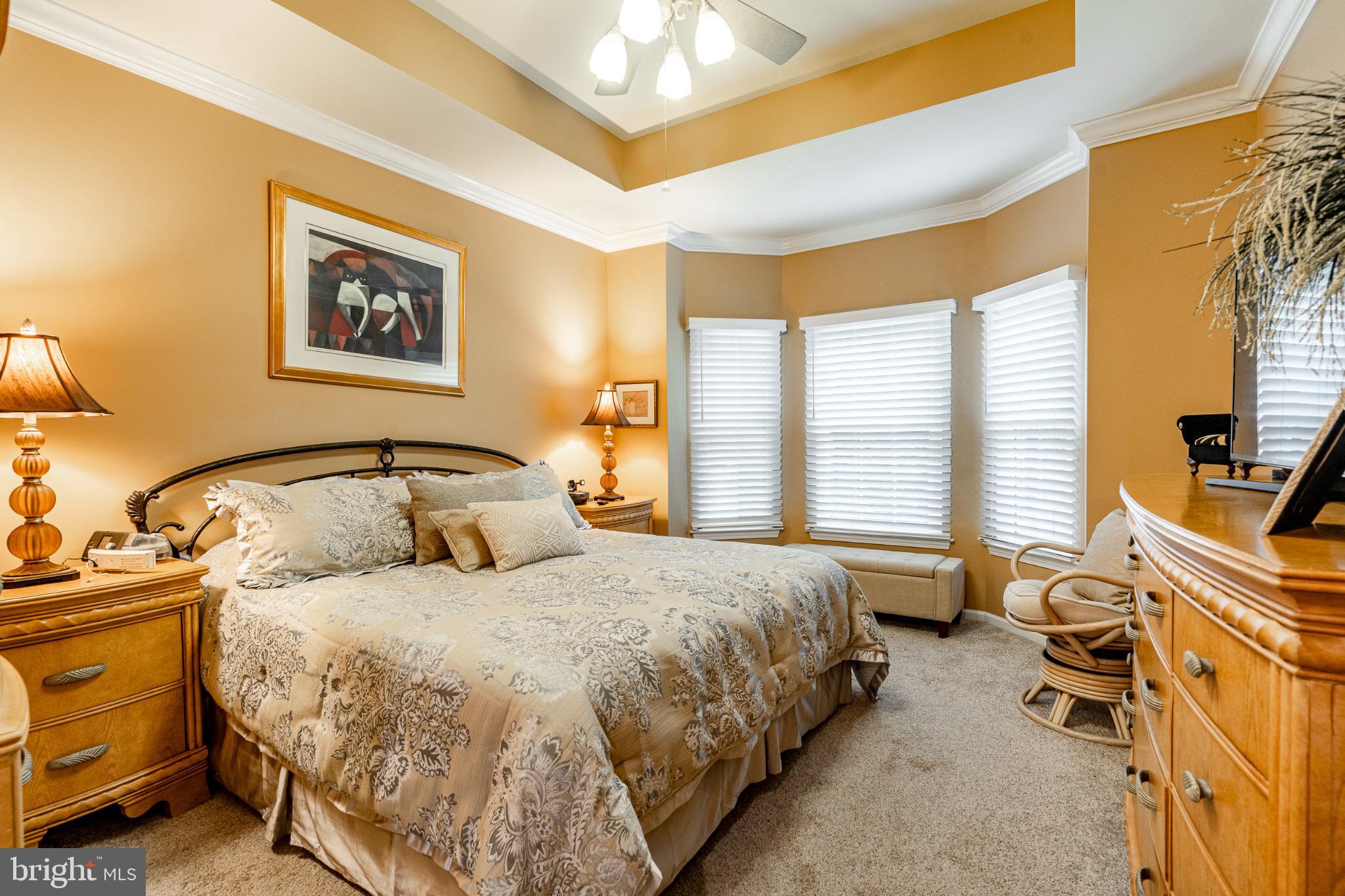 71 Dresner Circle Upper Chichester, PA 19061 - Photo 15 of 46 a spacious bedroom with a bed and a chandelier