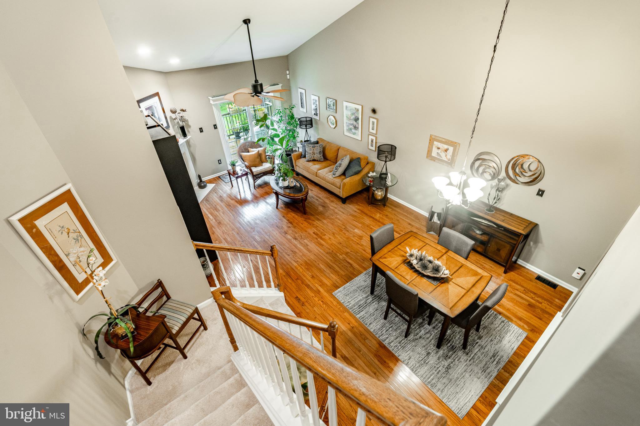 71 Dresner Circle Upper Chichester, PA 19061 - Photo 20 of 46 a living room with furniture and a chandelier