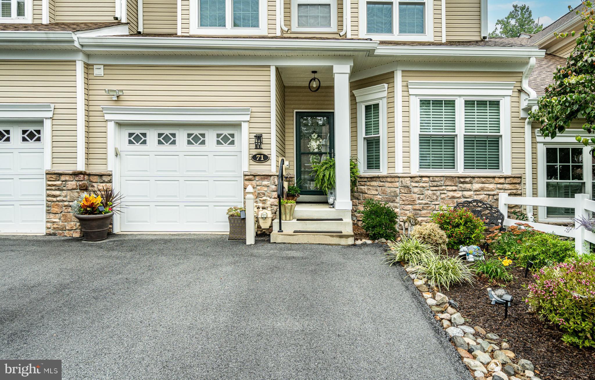 71 Dresner Circle Upper Chichester, PA 19061 - Photo 2 of 46 front view of a house with potted plants