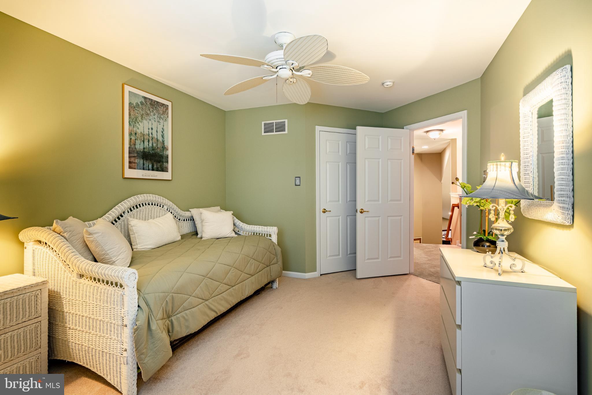 71 Dresner Circle Upper Chichester, PA 19061 - Photo 22 of 46 a spacious bedroom with a bed and a chandelier