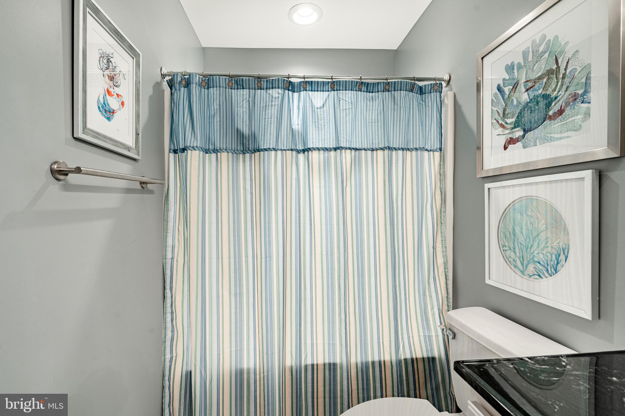 71 Dresner Circle Upper Chichester, PA 19061 - Photo 26 of 46 a view of a hallway with paintings on the wall