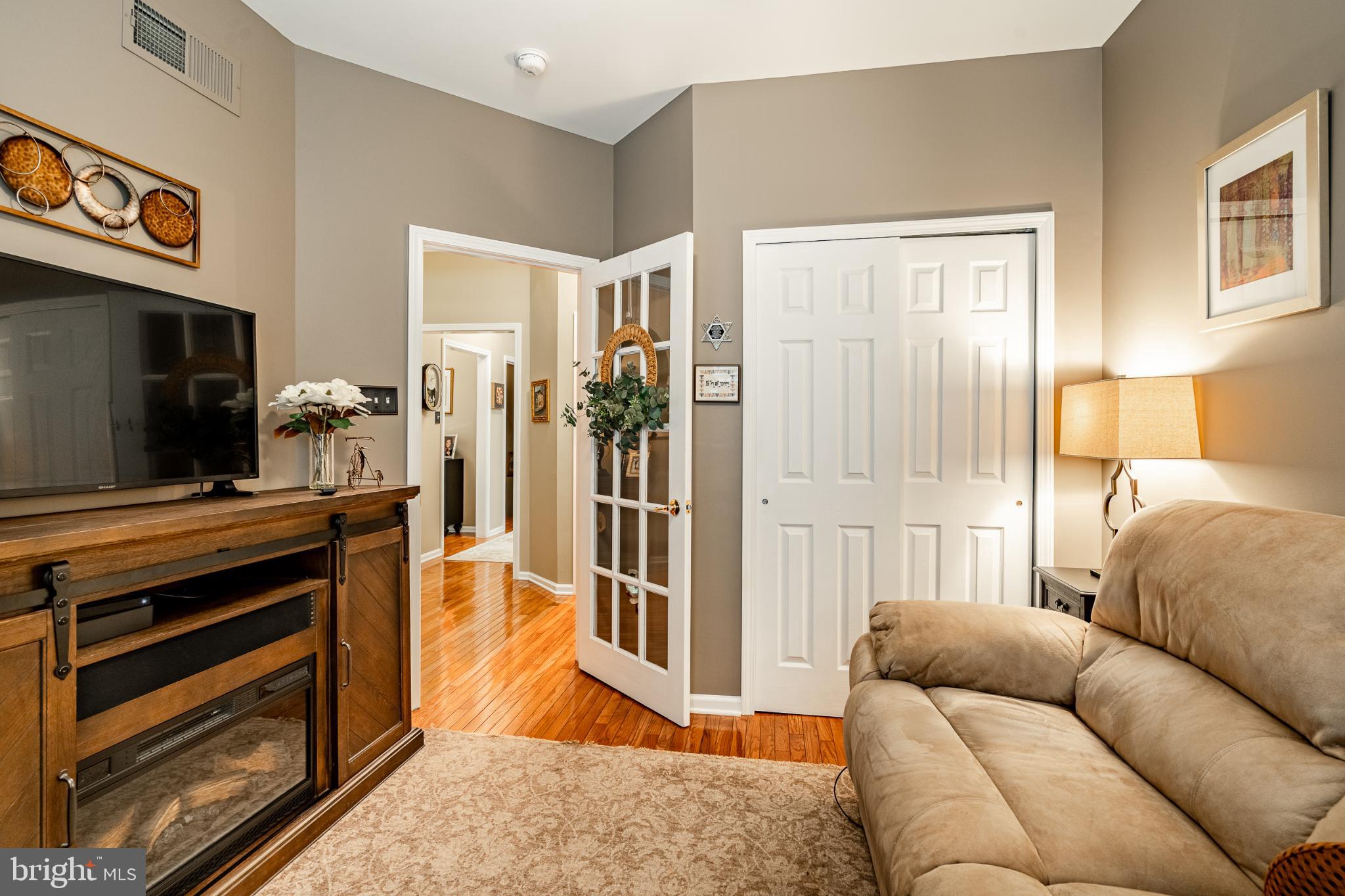 71 Dresner Circle Upper Chichester, PA 19061 - Photo 4 of 46 a living room with furniture and a flat screen tv