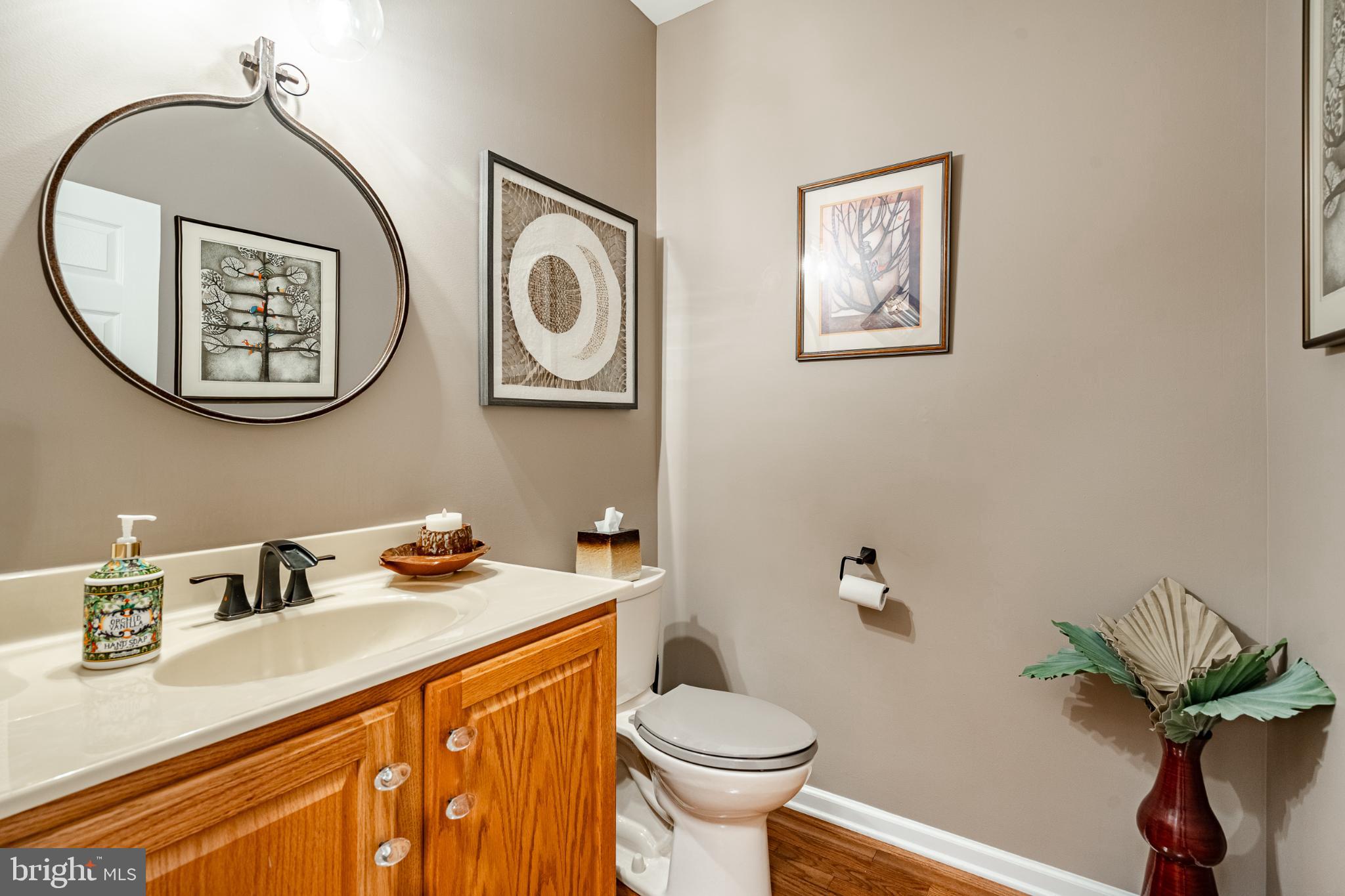 71 Dresner Circle Upper Chichester, PA 19061 - Photo 5 of 46 a bathroom with a toilet sink and mirror