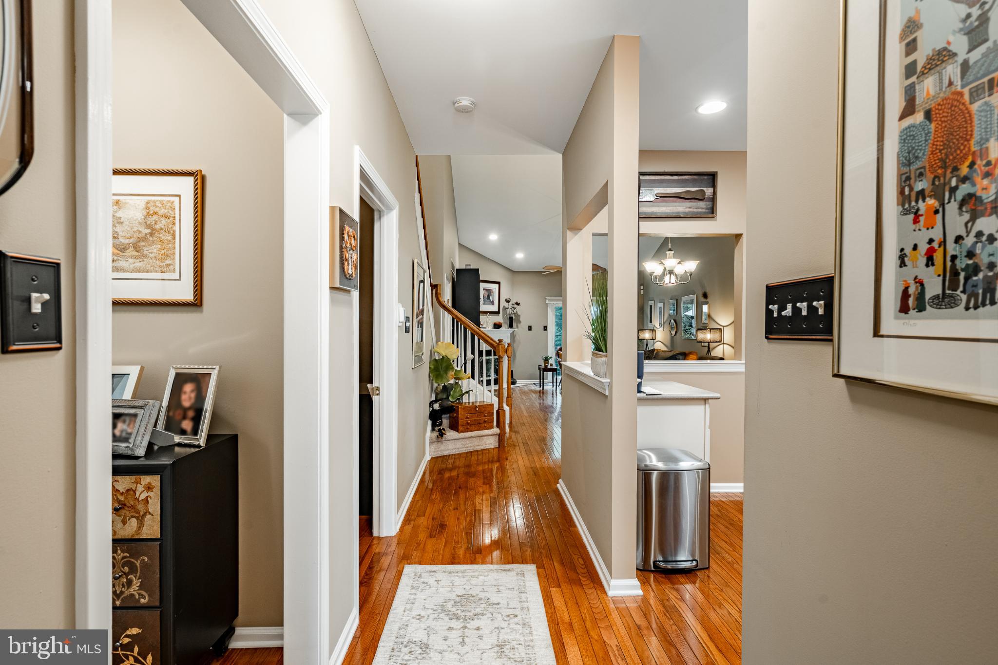 71 Dresner Circle Upper Chichester, PA 19061 - Photo 9 of 46 a hallway with a dining table and chairs in it