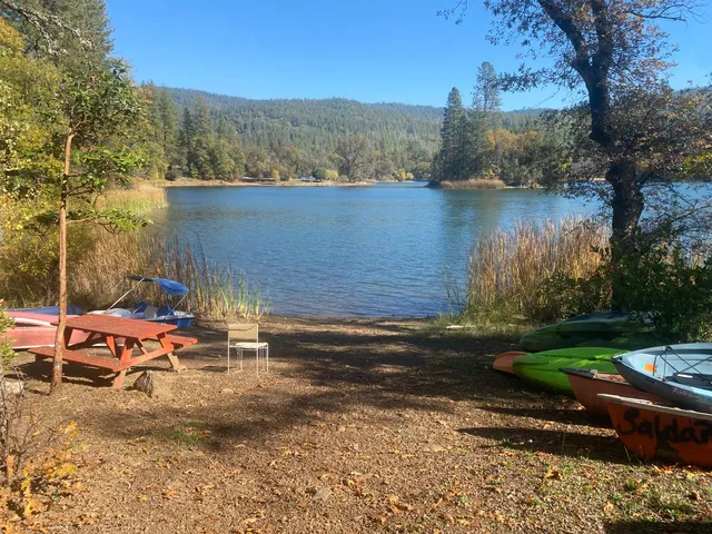 a view of a lake with green space