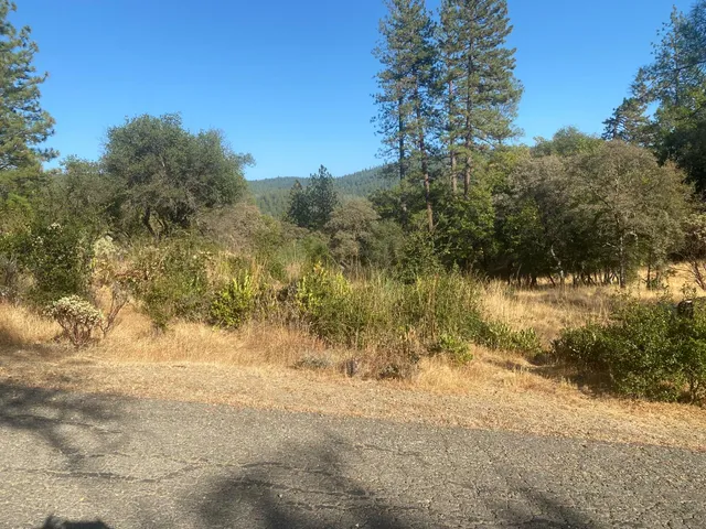 a view of mountain view with mountains in the background