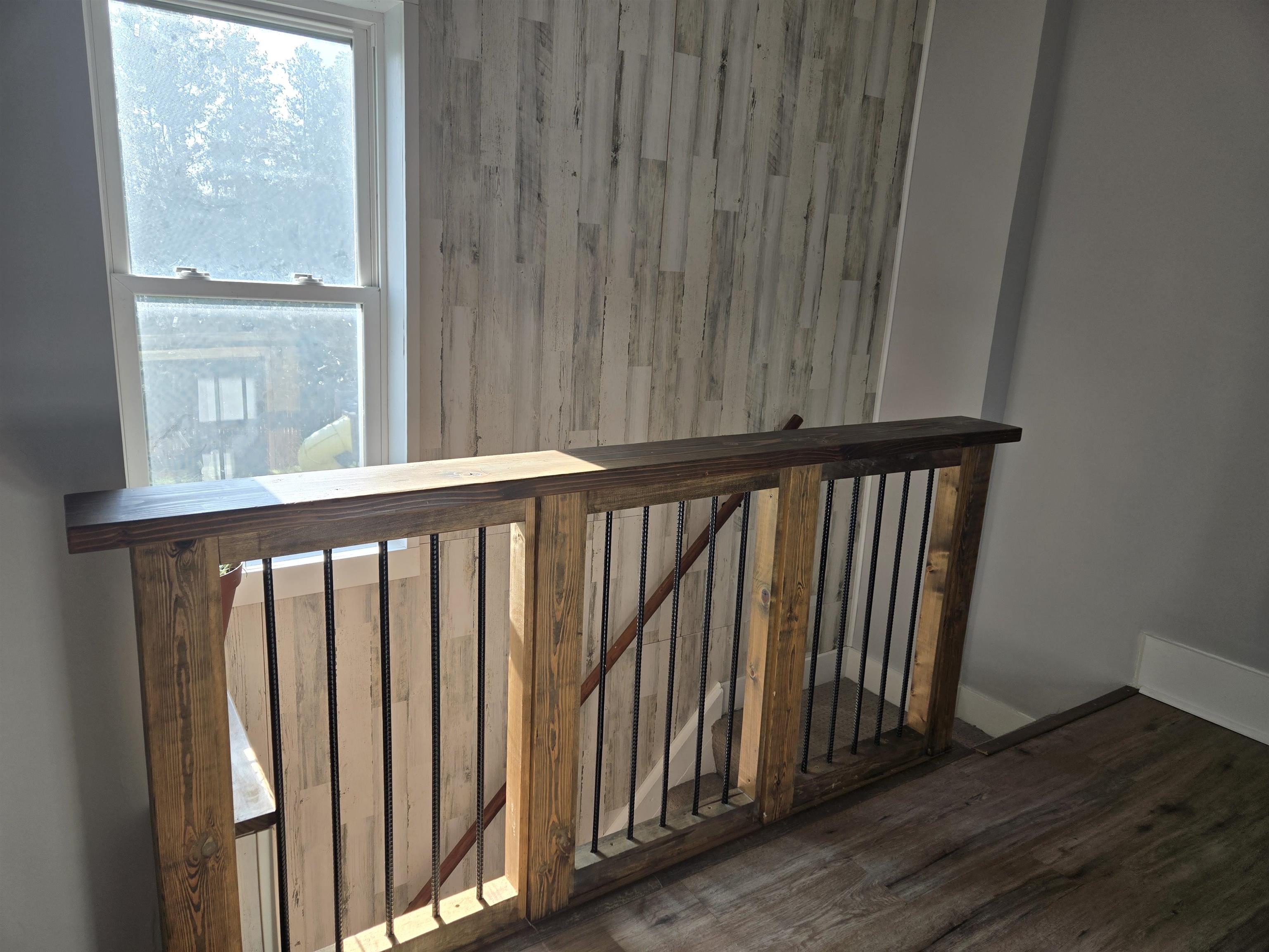 732 West 2nd Street Byron, IL 61010 - Photo 13 of 22 a view of a porch with wooden floor