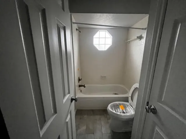 a bathroom with a sink a bathtub and a shower