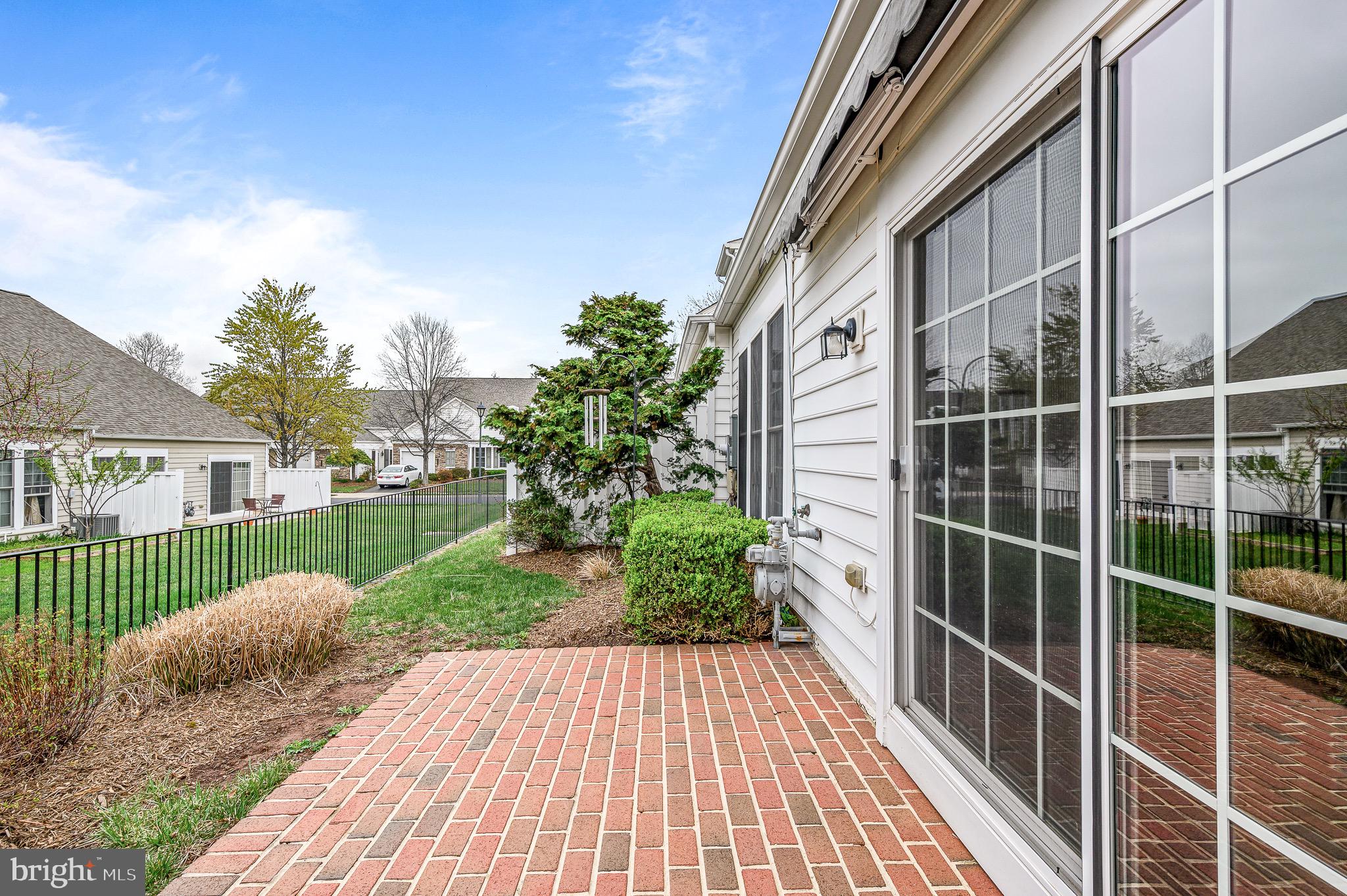44422 Sunset Maple Drive Ashburn, VA 20147 - Photo 12 of 40 a view of a house with a yard
