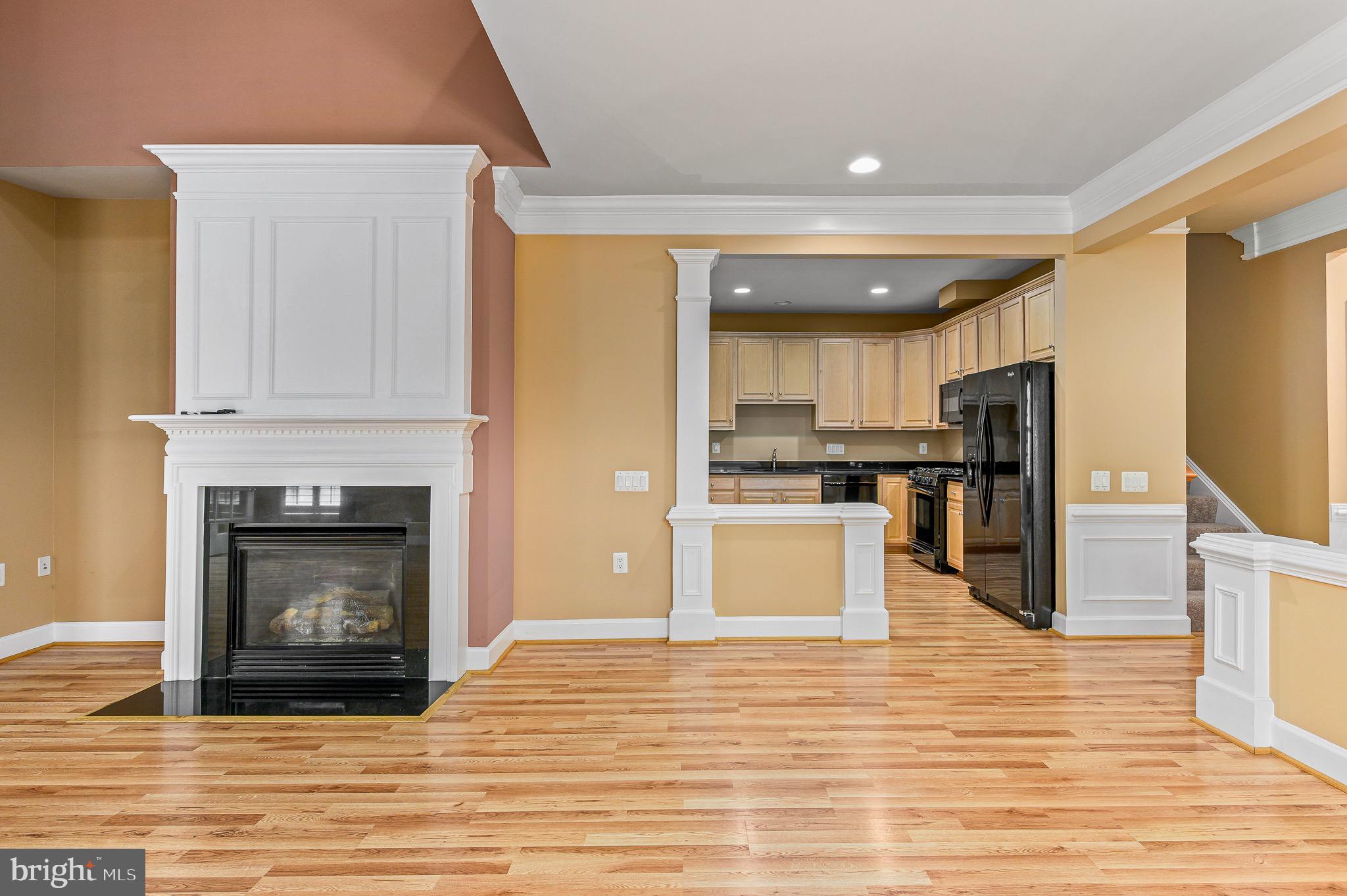 44422 Sunset Maple Drive Ashburn, VA 20147 - Photo 16 of 40 a view of kitchen with granite countertop cabinets and refrigerator