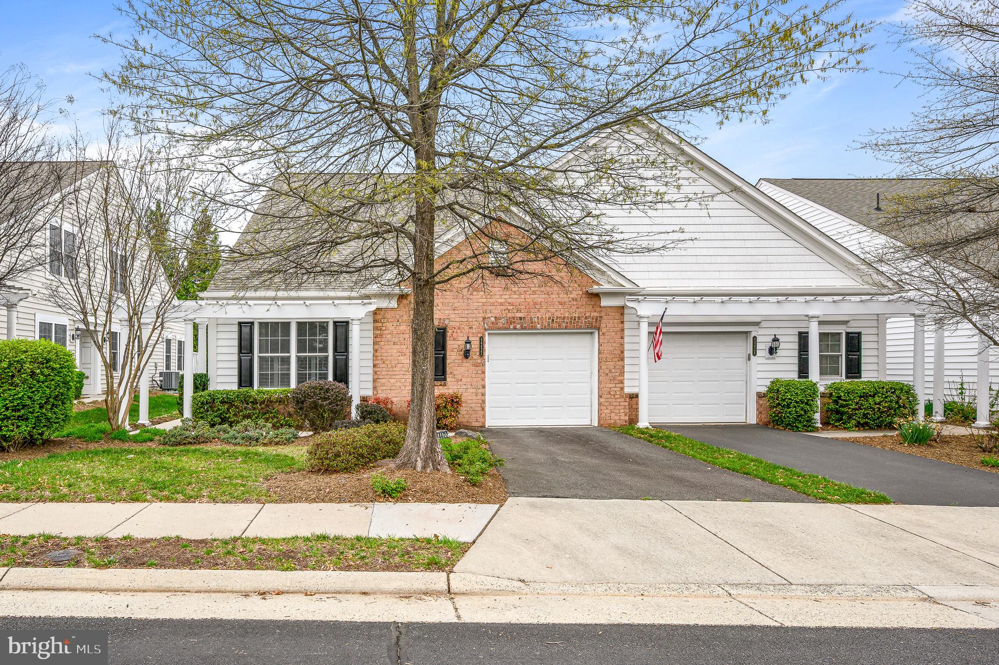 44422 Sunset Maple Drive Ashburn, VA 20147 - Photo 4 of 40 front view of a house and a yard