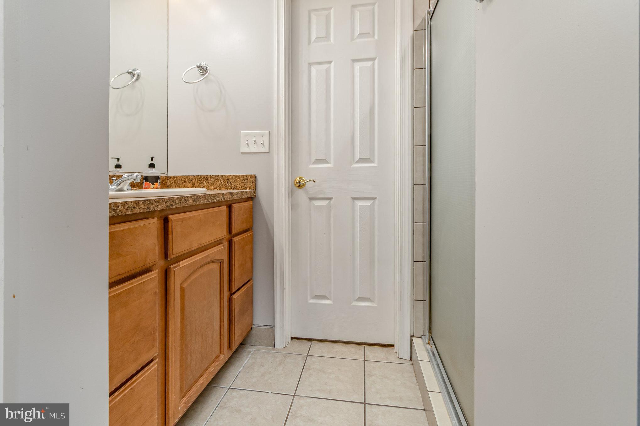 2204 Blevins Road Edgewood, MD 21040 - Photo 22 of 28 a view of a bathroom with mirror