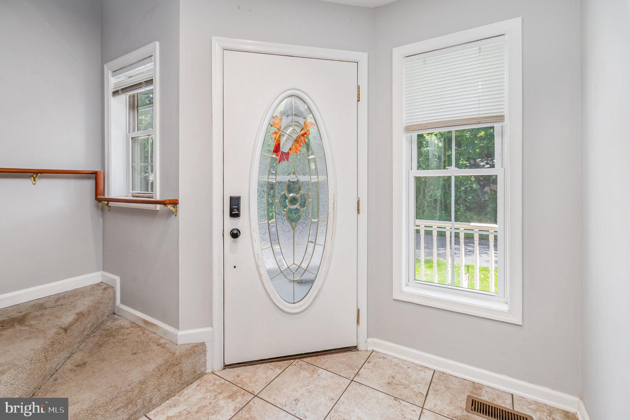 2204 Blevins Road Edgewood, MD 21040 - Photo 5 of 28 a view of an entryway with wooden floor and windows