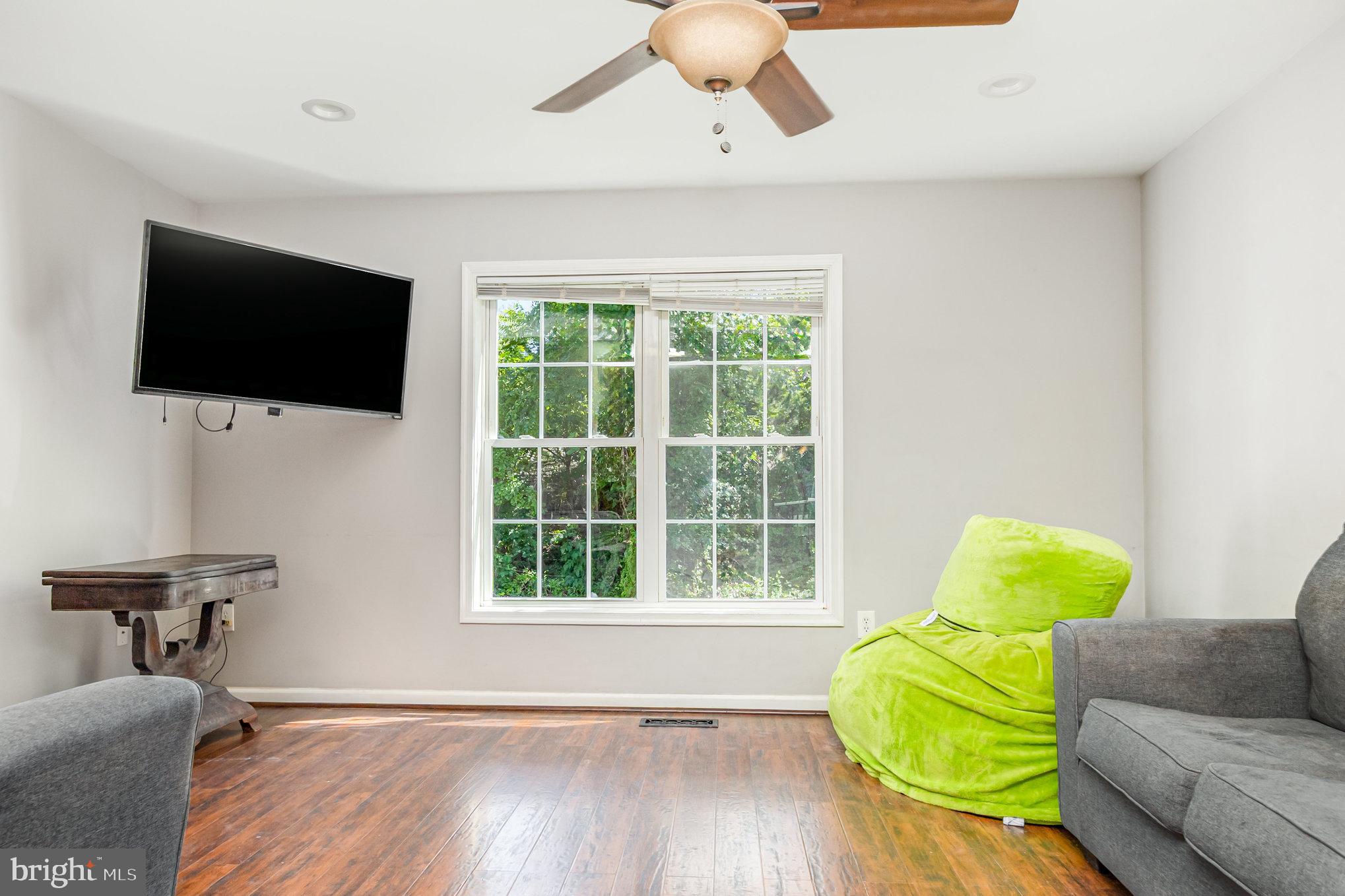 2204 Blevins Road Edgewood, MD 21040 - Photo 6 of 28 a living room with furniture and a flat screen tv