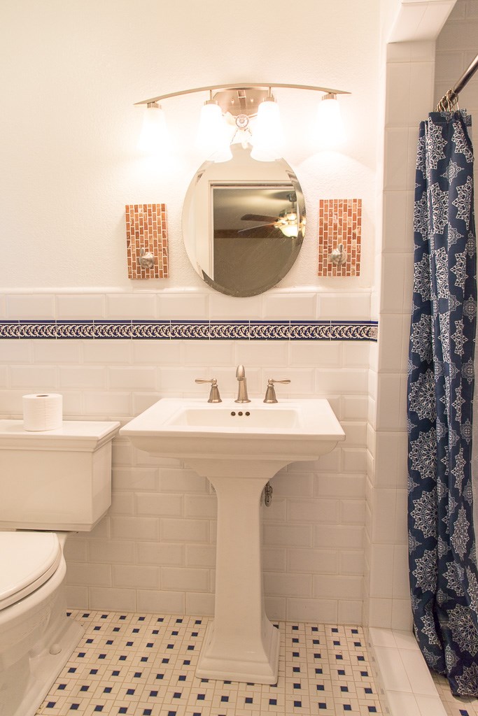 9010 Linkmeadow Lane Houston, TX 77025 - Photo 32 of 39 a bathroom with a sink toilet and shower