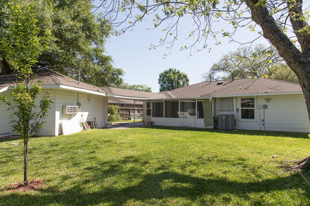 9010 Linkmeadow Lane Houston, TX 77025 - Photo 39 of 39 a view of a house with pool and a yard