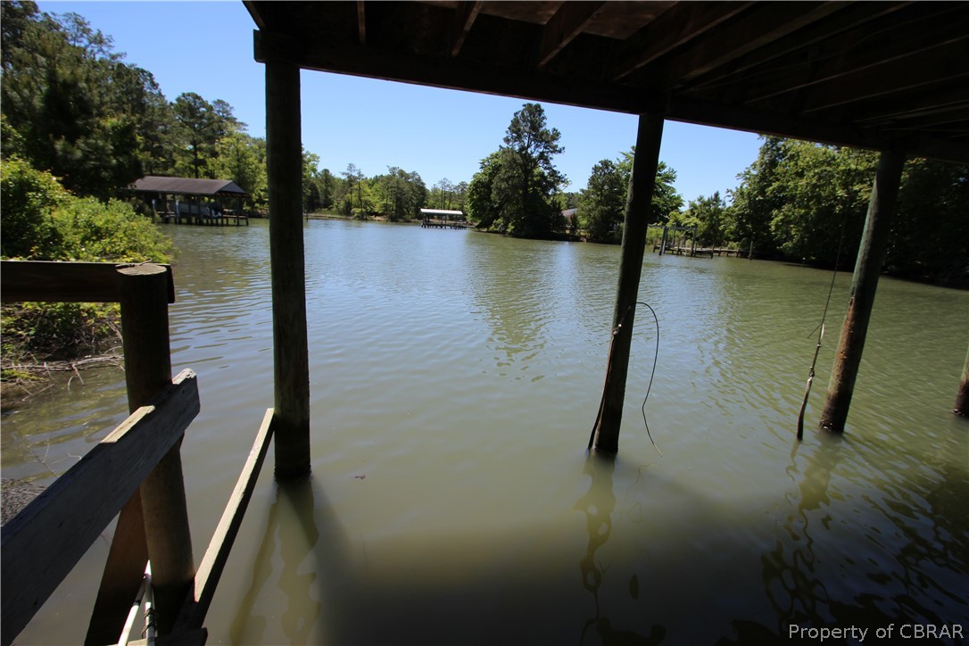 815 Holly Point Road Mathews, VA 23109 - Photo 5 of 9 a view of a lake from a balcony