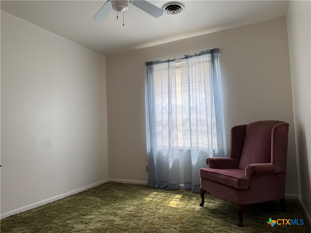 411 Cardinal Avenue Killeen, TX 76541 - Photo 12 of 14 a living room with furniture and a window