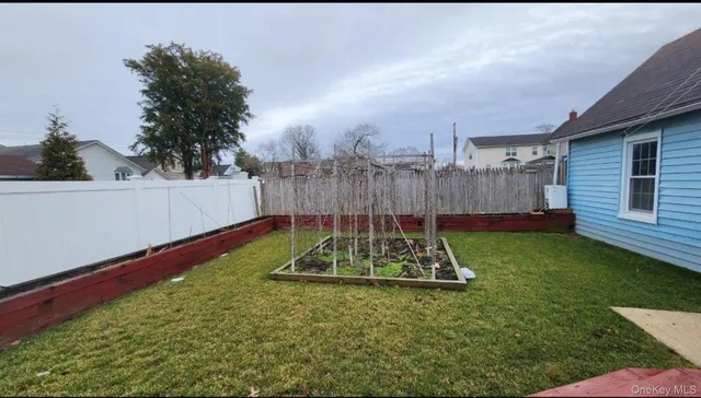 a view of a backyard with a garden