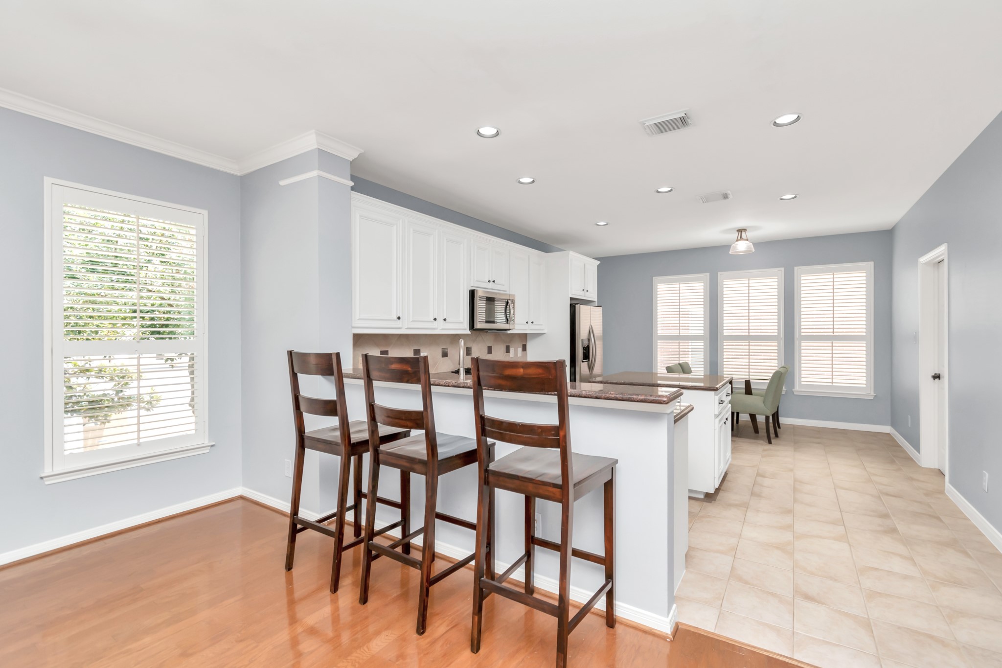 2901 West Dallas Street Houston, TX 77019 - Photo 17 of 39 a view of a dining room with furniture and wooden floor