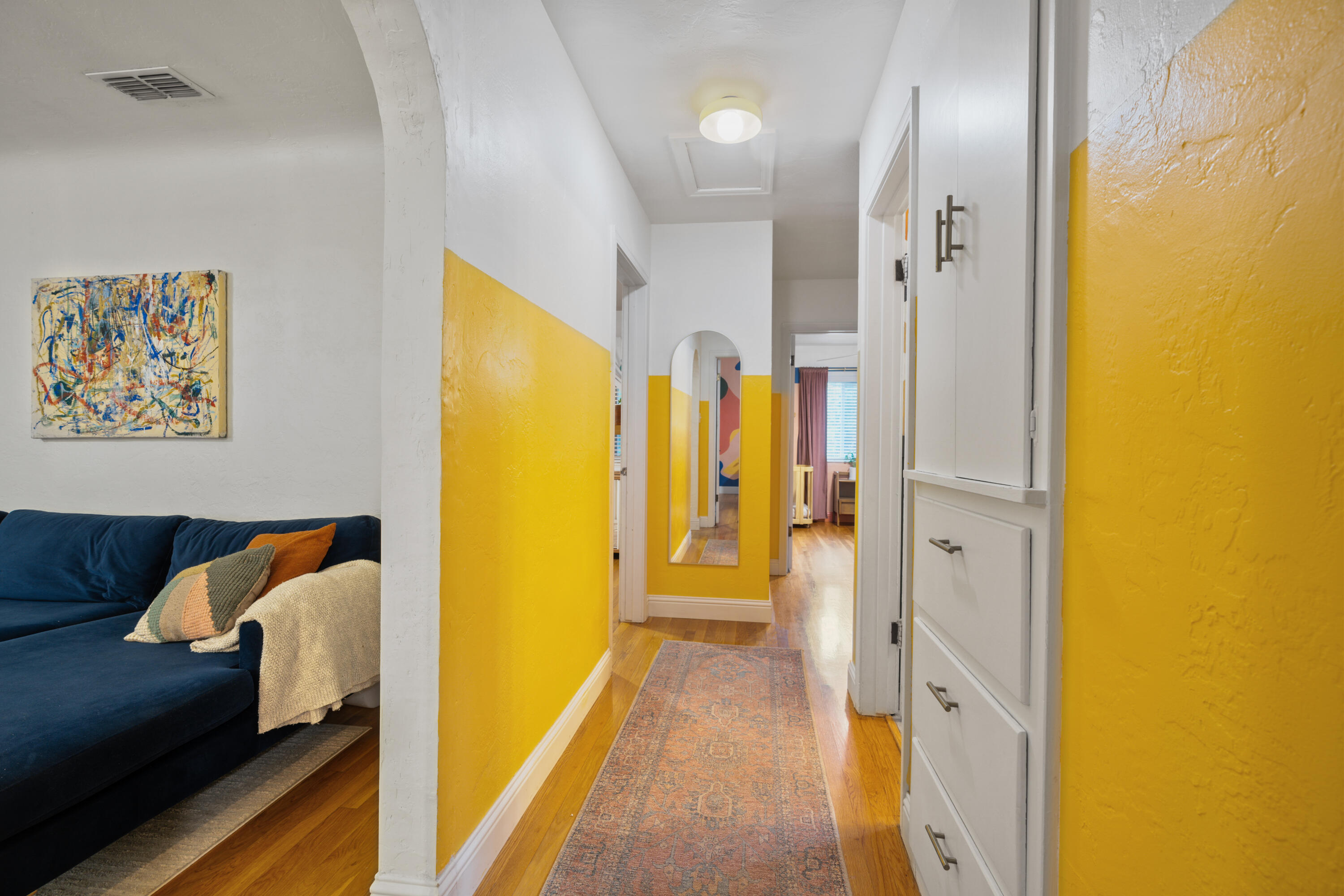 2056 Canal Drive Redding, CA 96001 - Photo 19 of 46 a view of a hallway with wooden floor and furniture
