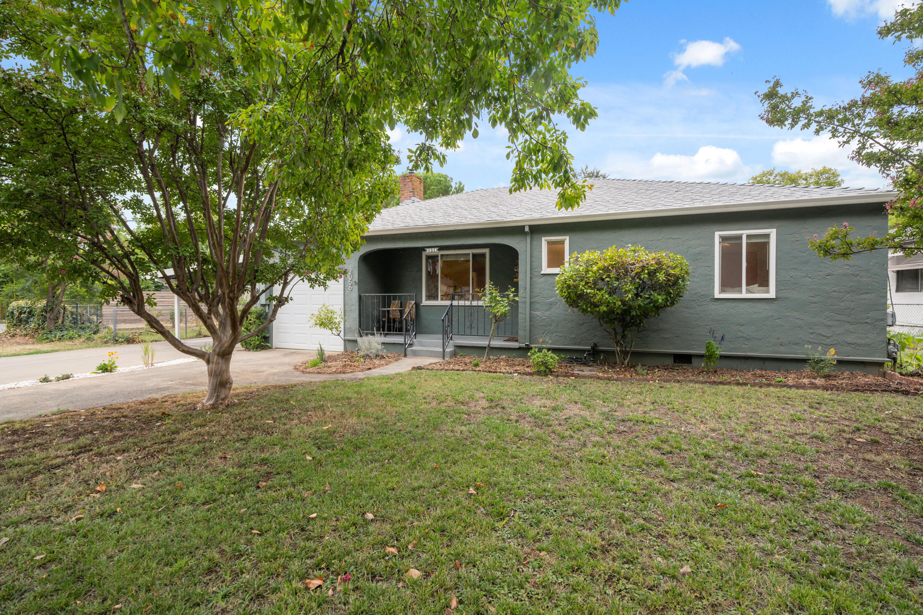 2056 Canal Drive Redding, CA 96001 - Photo 31 of 46 a house view with a garden space