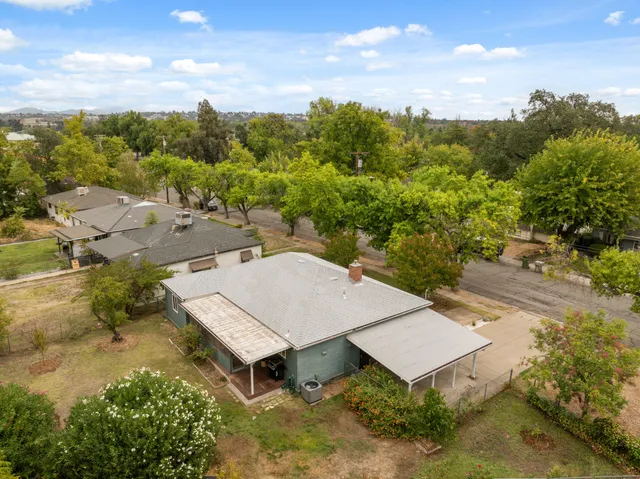 an aerial view of a house having yard