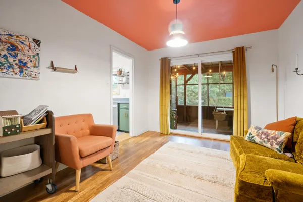 a bedroom with furniture and a window