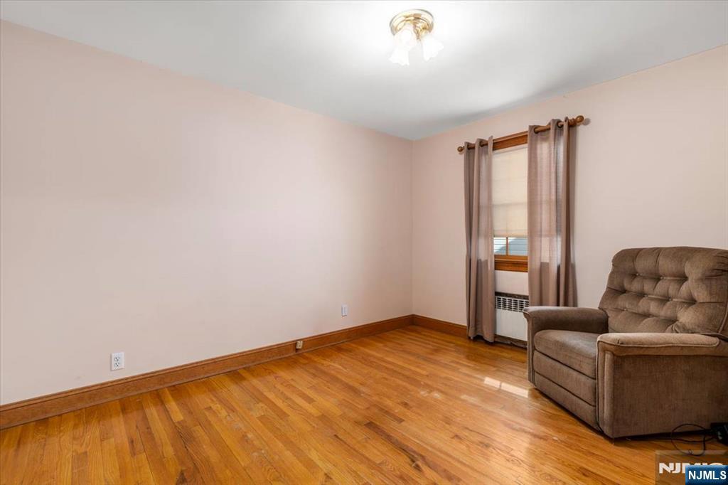 618 3rd Avenue Lyndhurst, NJ 07071 - Photo 13 of 33 a living room with furniture and a ceiling fan