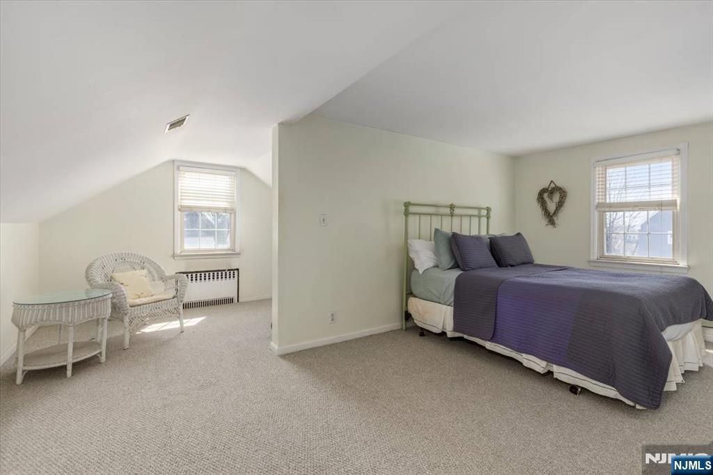 618 3rd Avenue Lyndhurst, NJ 07071 - Photo 20 of 33 a bedroom with a bed chair and a window