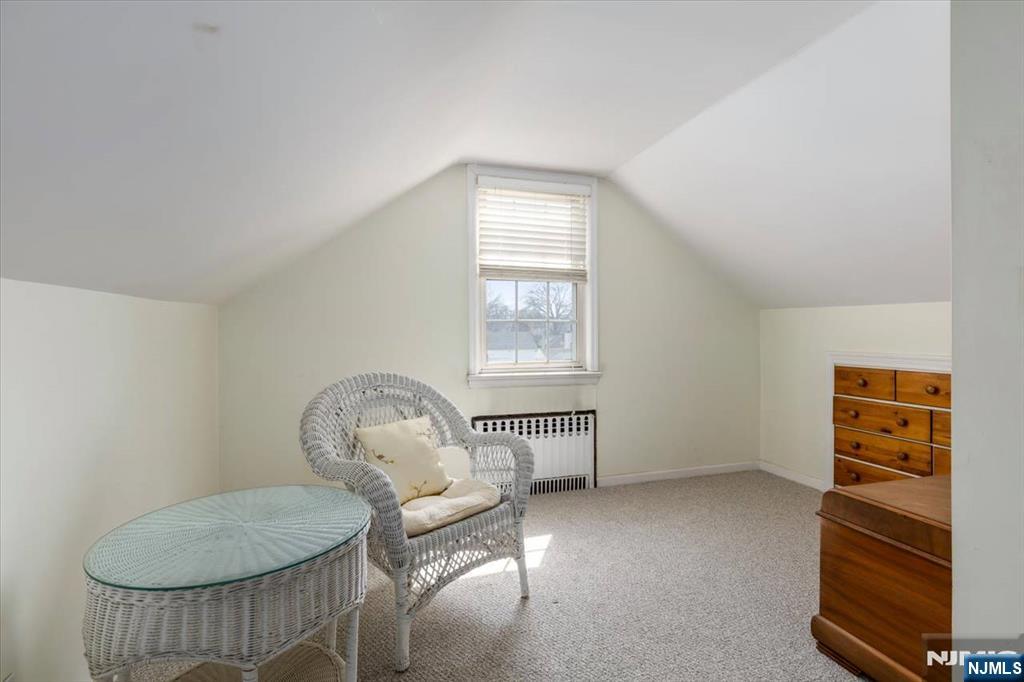 618 3rd Avenue Lyndhurst, NJ 07071 - Photo 22 of 33 a living room with furniture and a window
