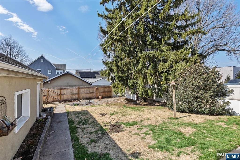 618 3rd Avenue Lyndhurst, NJ 07071 - Photo 27 of 33 a view of a house with a yard