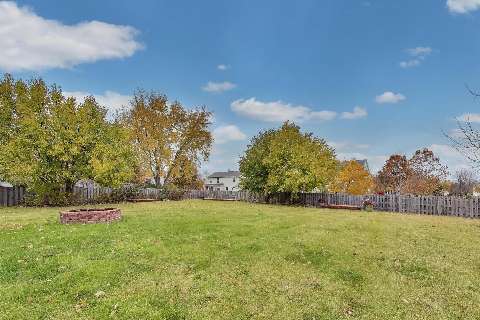 697 Providence Lane Lindenhurst, IL 60046 - Photo 28 of 31 a view of yard with tree and green space