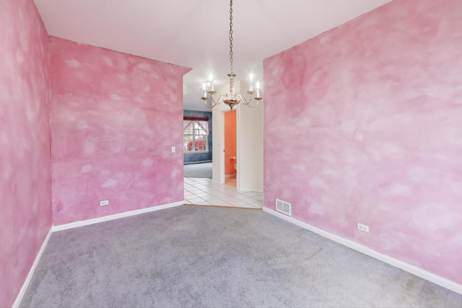 697 Providence Lane Lindenhurst, IL 60046 - Photo 8 of 31 a view of a chandelier and a chandelier fan