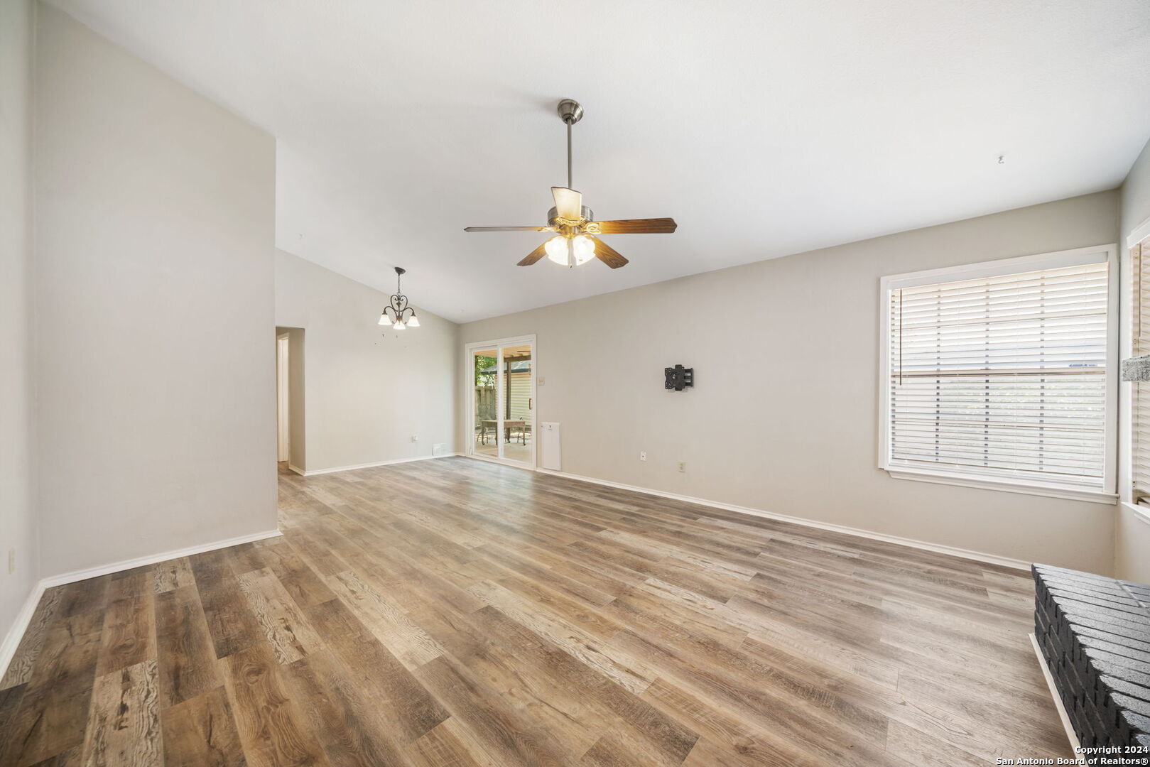 12106 Ridge Ct Street San Antonio, TX 78247 - Photo 13 of 25 a view of an empty room with a window
