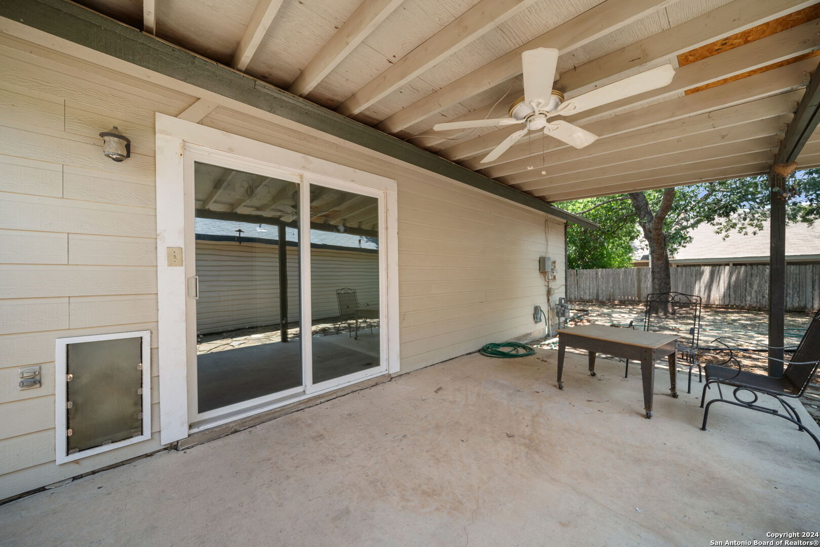 12106 Ridge Ct Street San Antonio, TX 78247 - Photo 22 of 25 a view of a porch with furniture and a yard