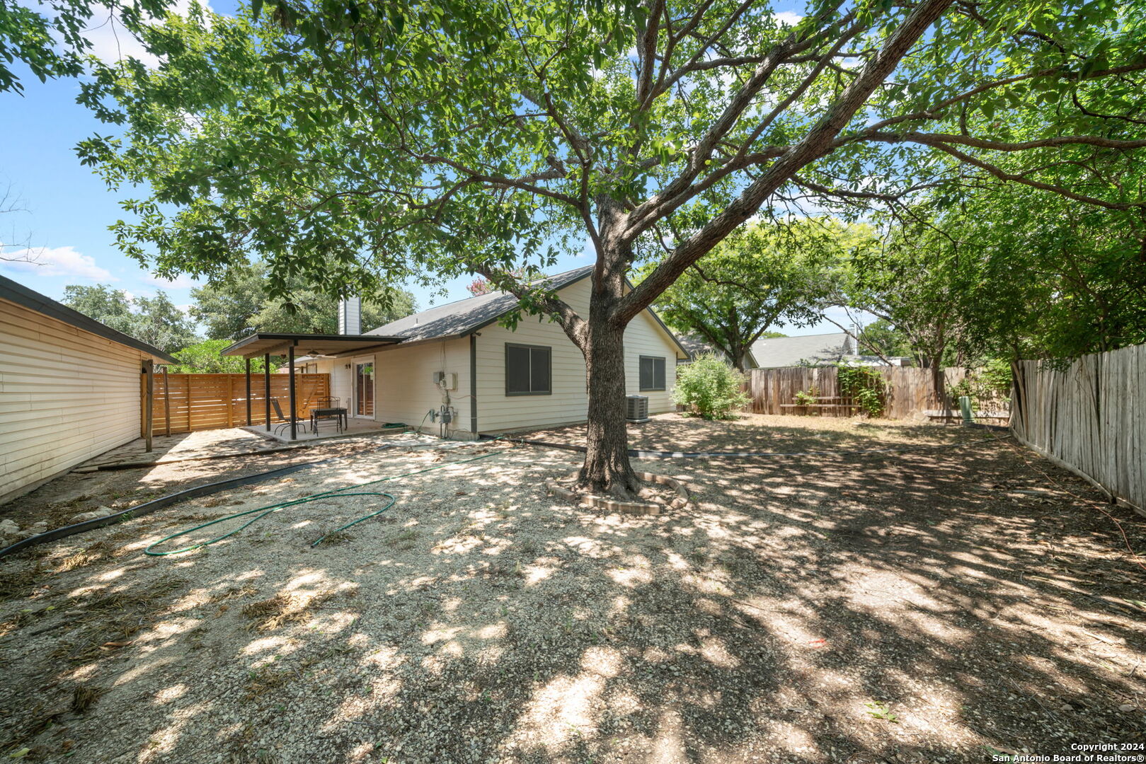 12106 Ridge Ct Street San Antonio, TX 78247 - Photo 23 of 25 a view of a house with a tree