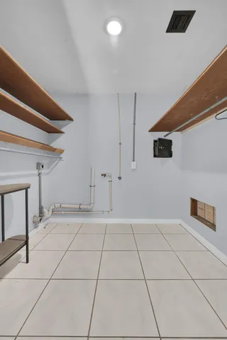 a view of an empty room with a window