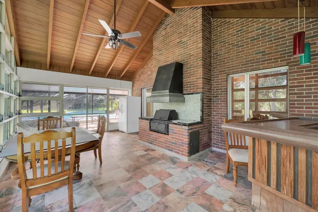 a outdoor space with lots of table and chairs