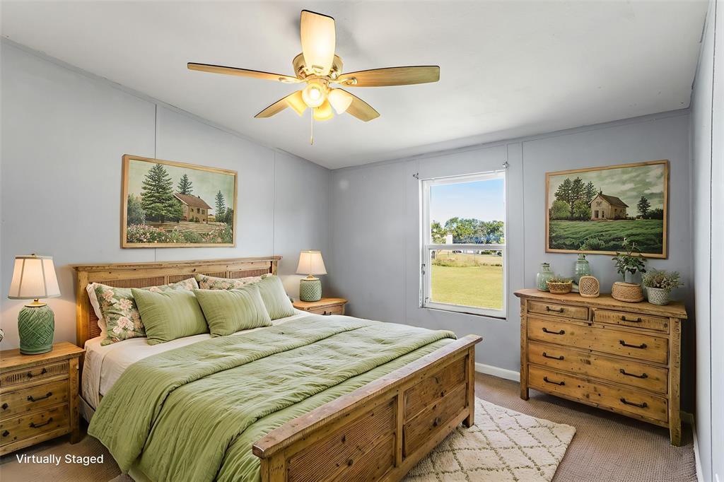 112 Pine Ridge Circle Southmayd, TX 75092 - Photo 17 of 25 a bedroom with a bed and a dresser