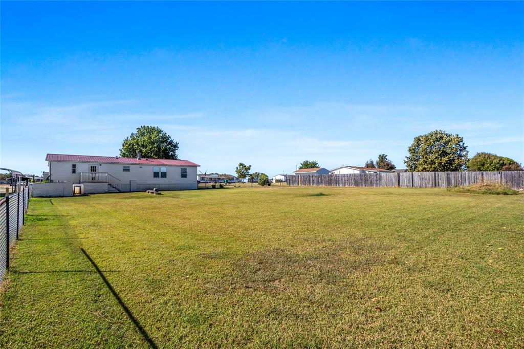 112 Pine Ridge Circle Southmayd, TX 75092 - Photo 19 of 25 a view of an ocean and beach