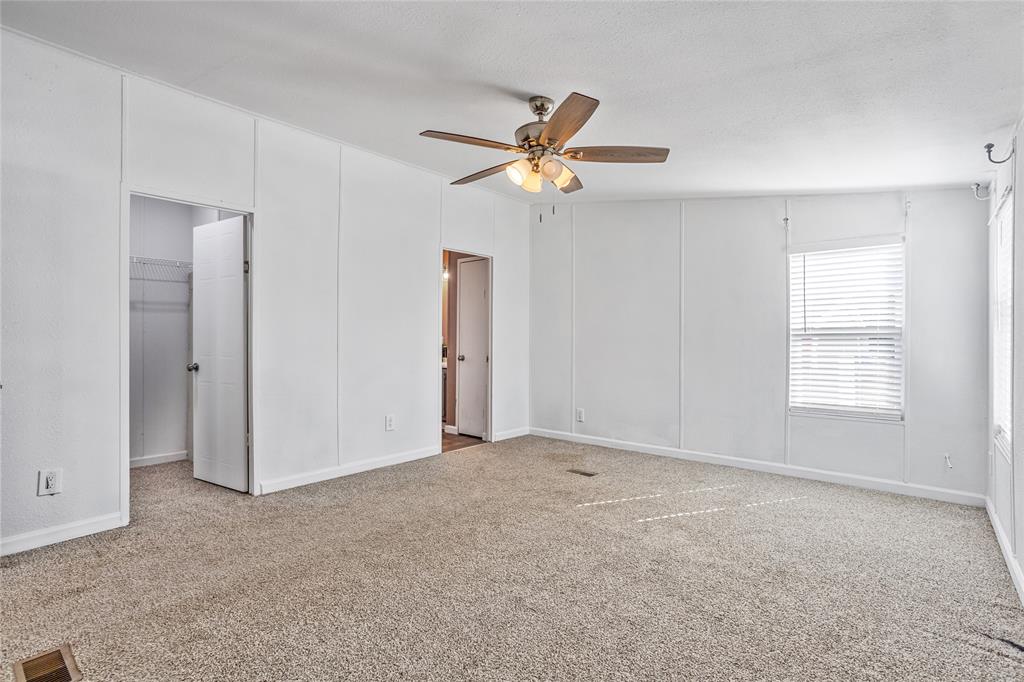 112 Pine Ridge Circle Southmayd, TX 75092 - Photo 10 of 25 a view of an empty room with a window