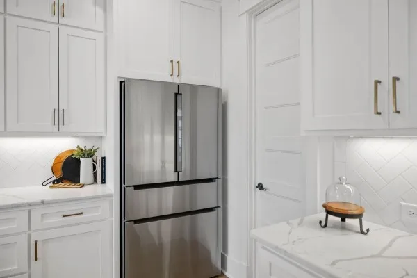 a bedroom with furniture and window