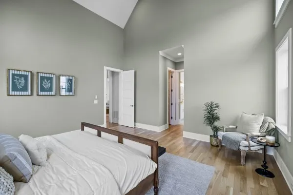 a spacious bathroom with a double vanity sink mirror and shower