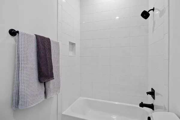 a view of living room with furniture and wooden floor
