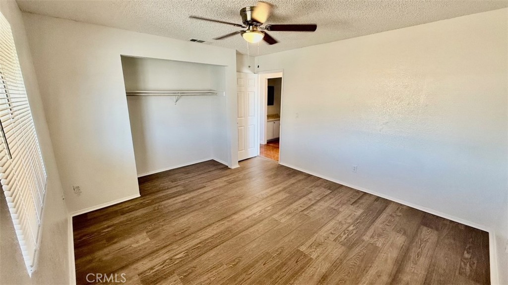 16026 K Street Mojave, CA 93501 - Photo 7 of 10 a view of empty room with wooden floor