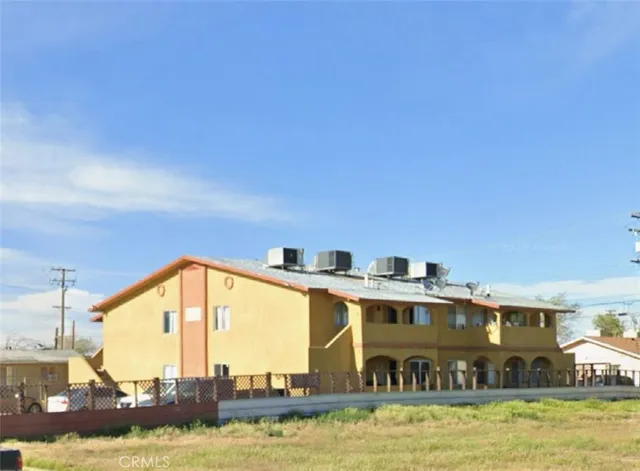 a view of a swimming pool with a chair