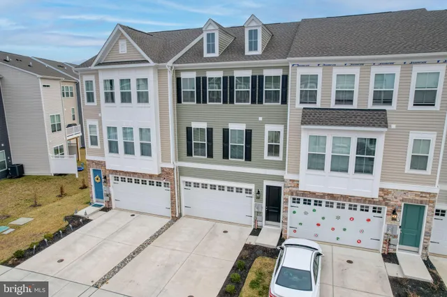 a front view of a building with glass windows