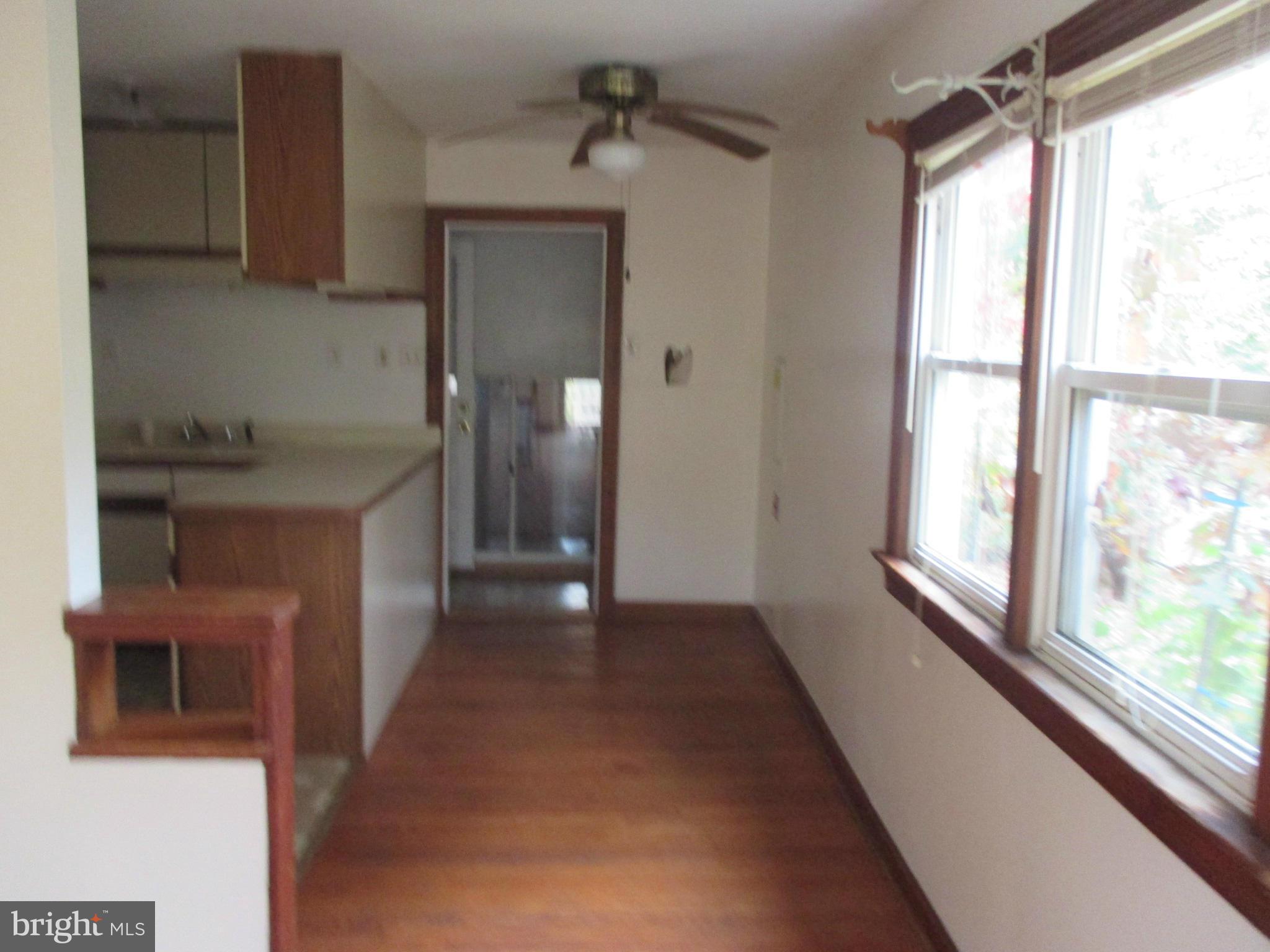 540 Londontown Road Edgewater, MD 21037 - Photo 7 of 14 a view of a kitchen from the hallway
